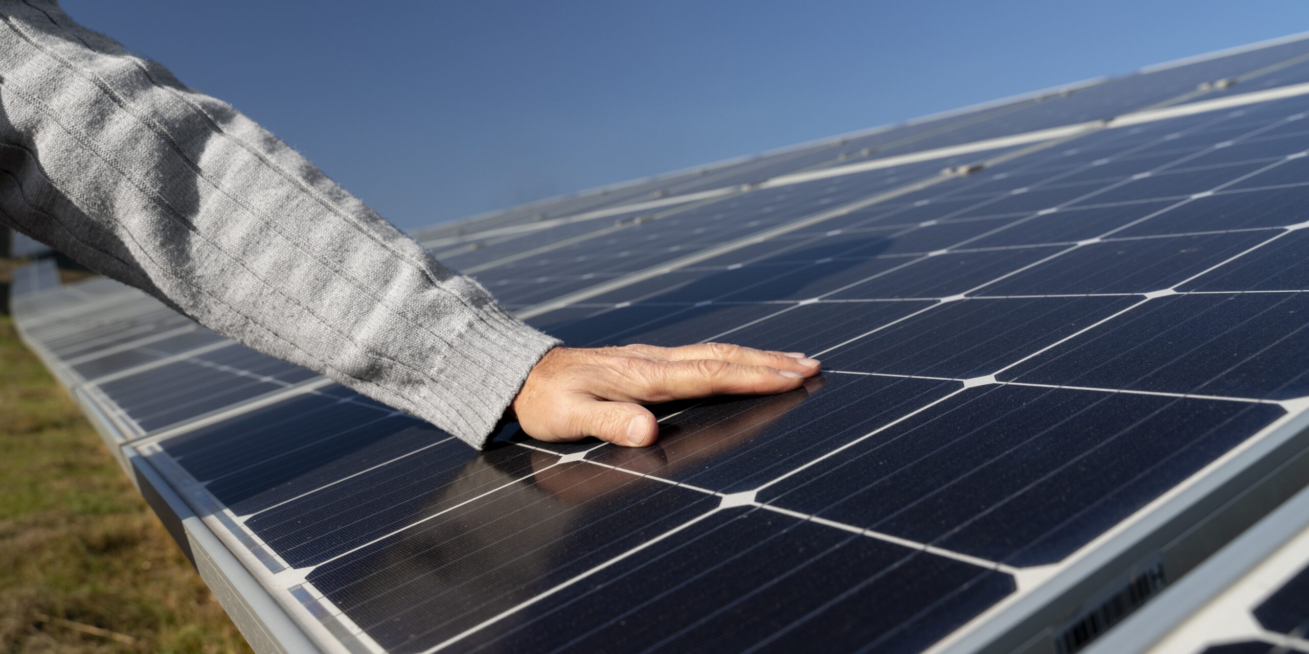 person-near-alternative-energy-plant