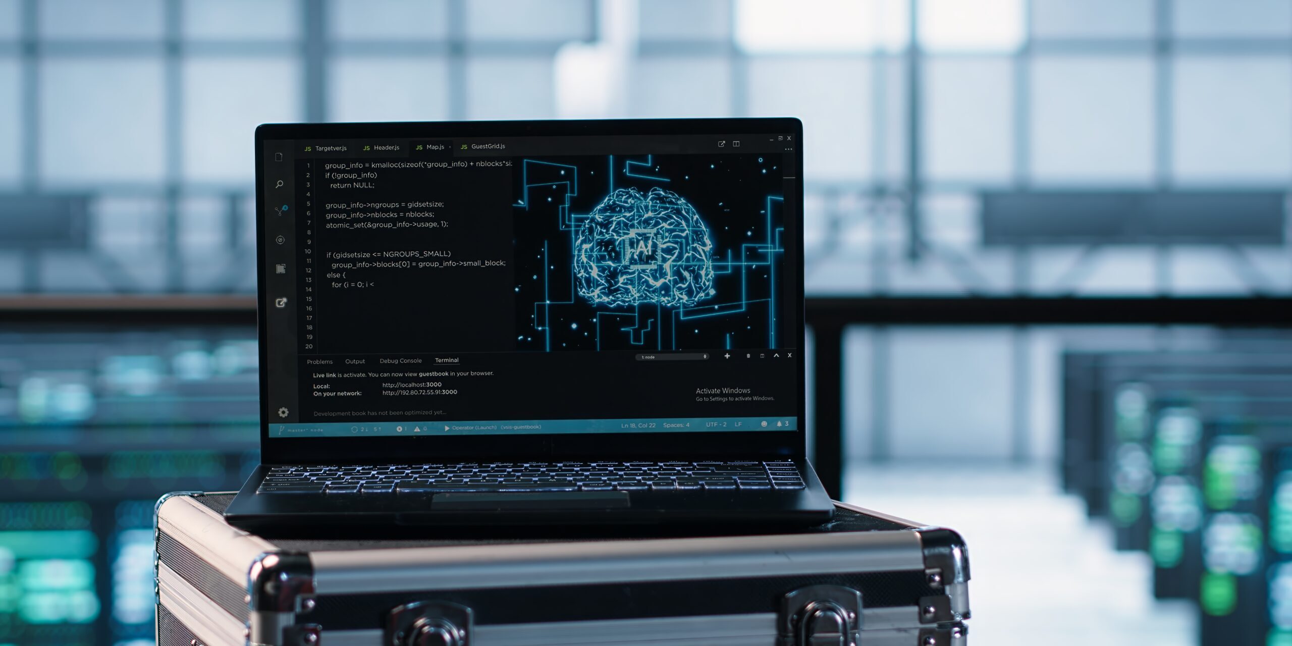 Laptop used by data center system administrators using AI tech, close up